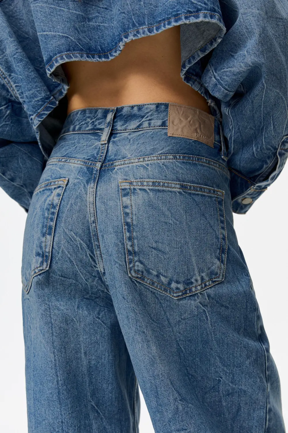 Jeans super baggy cintura cruzada