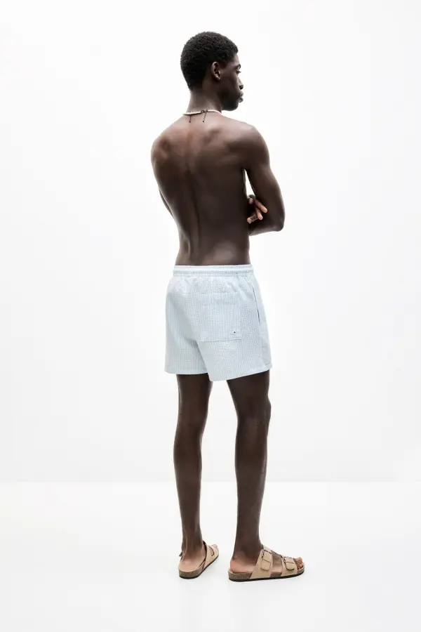 Striped seersucker swimming trunks
