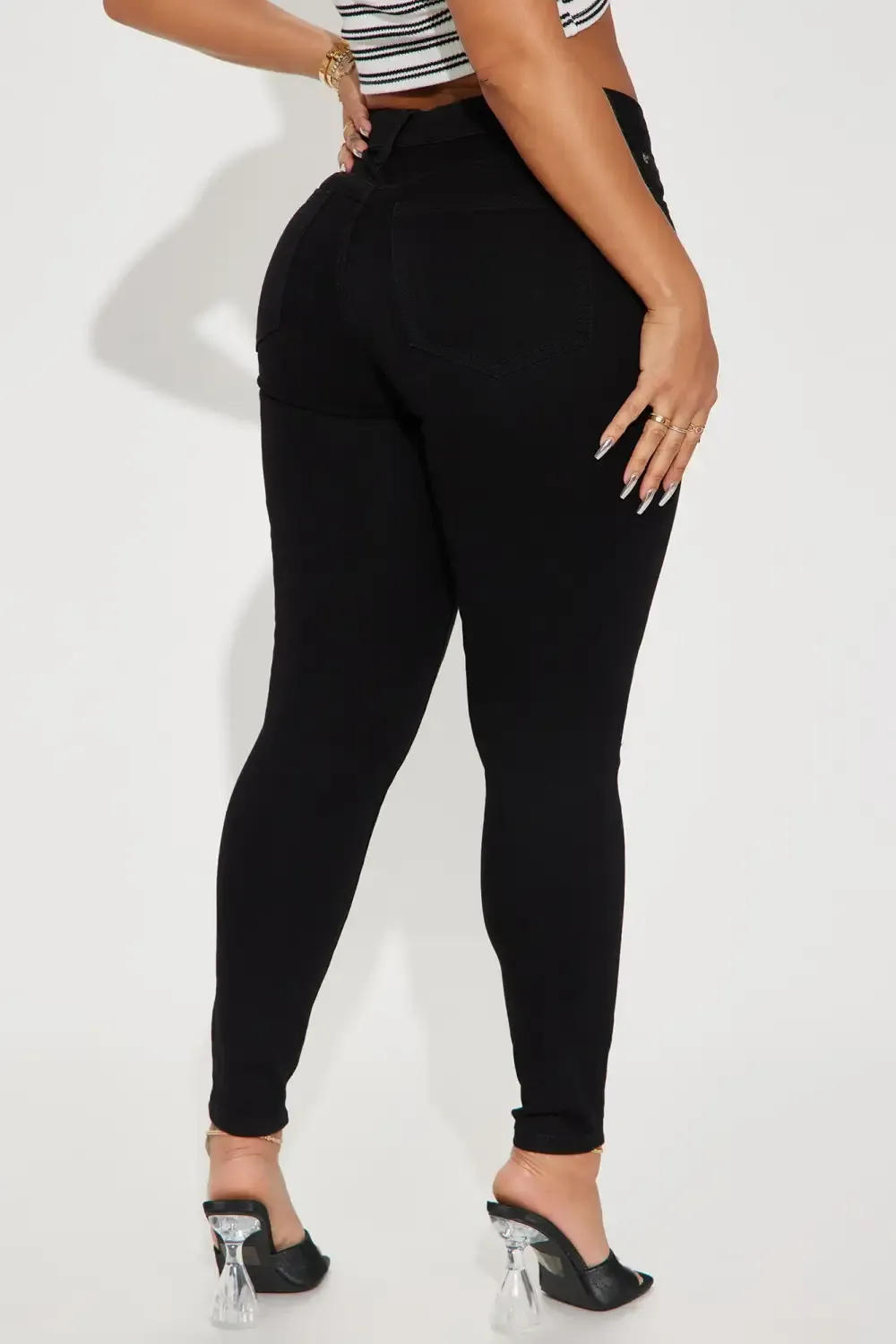 Caviar Mid Rise Ripped Ankle Skinny Jean - Black