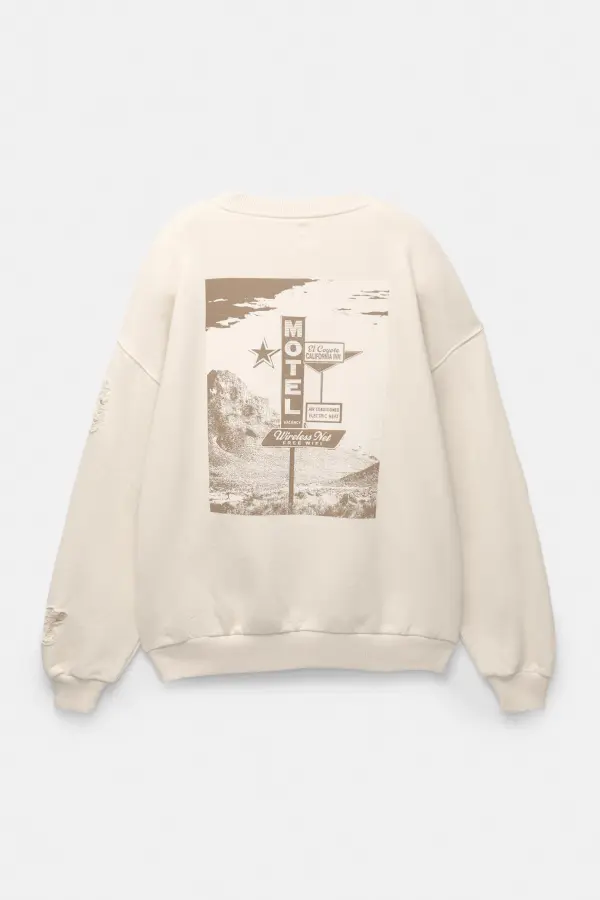 Sudadera motel detalle rotos