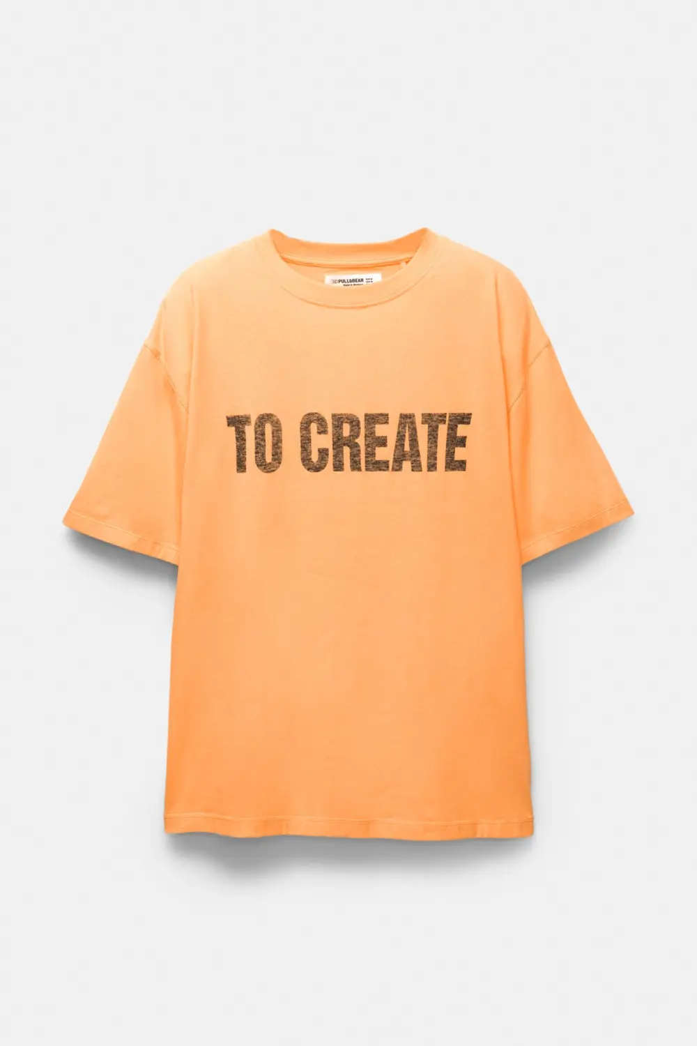 Camiseta naranja texto