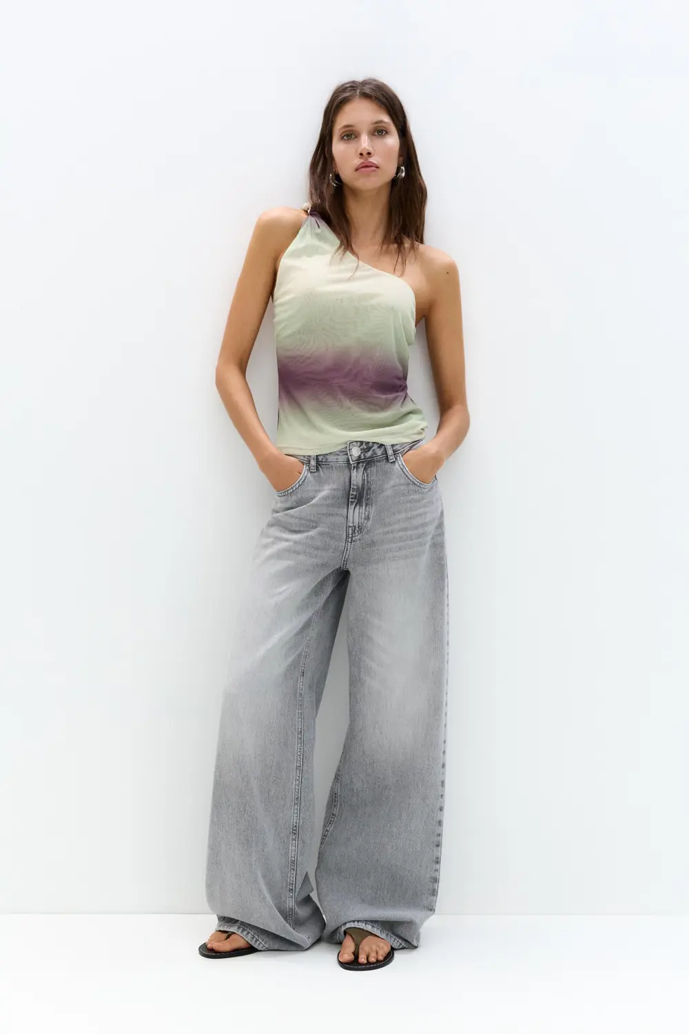 Asymmetric tulle top with a knotted strap