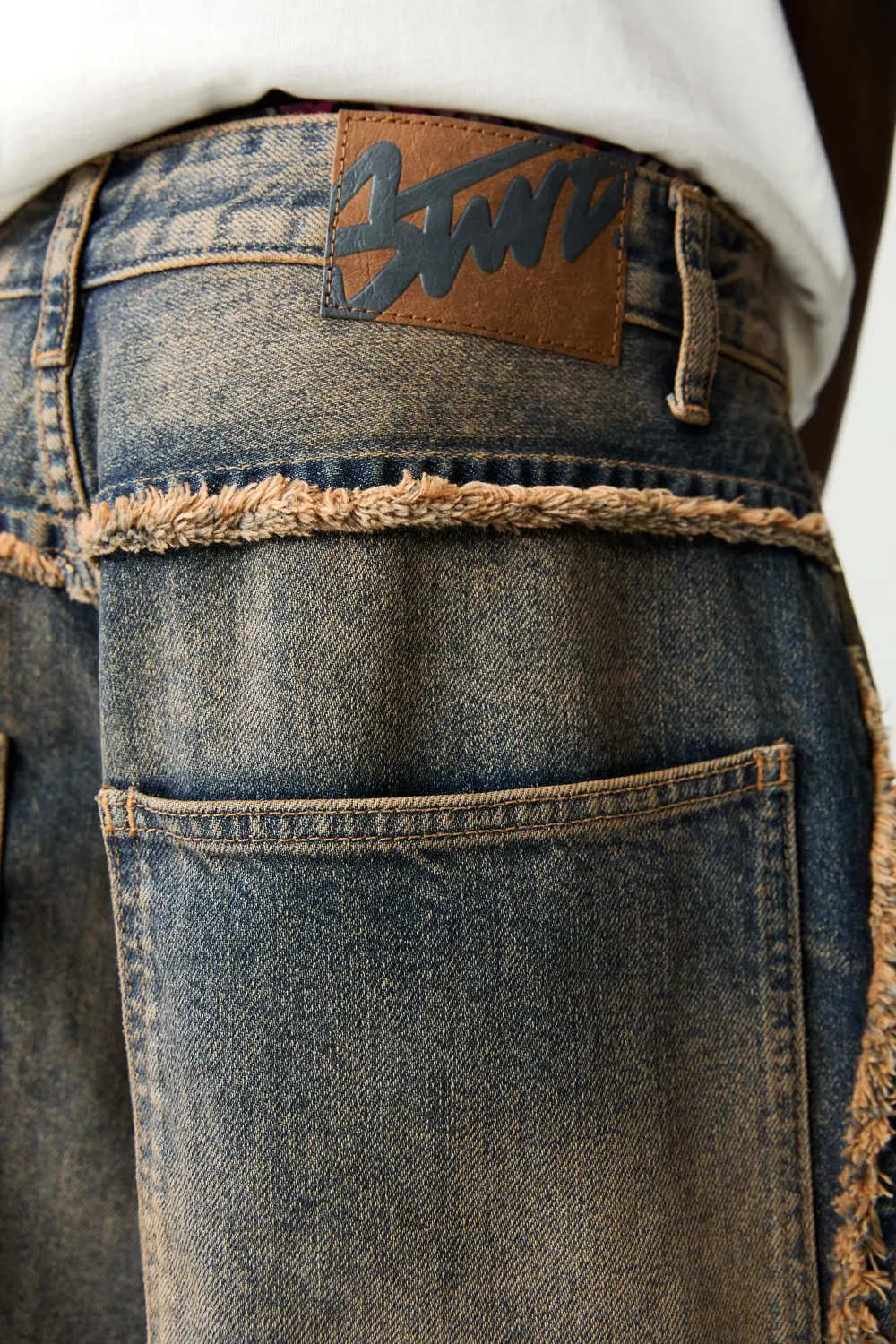 Baggy jeans with fringing
