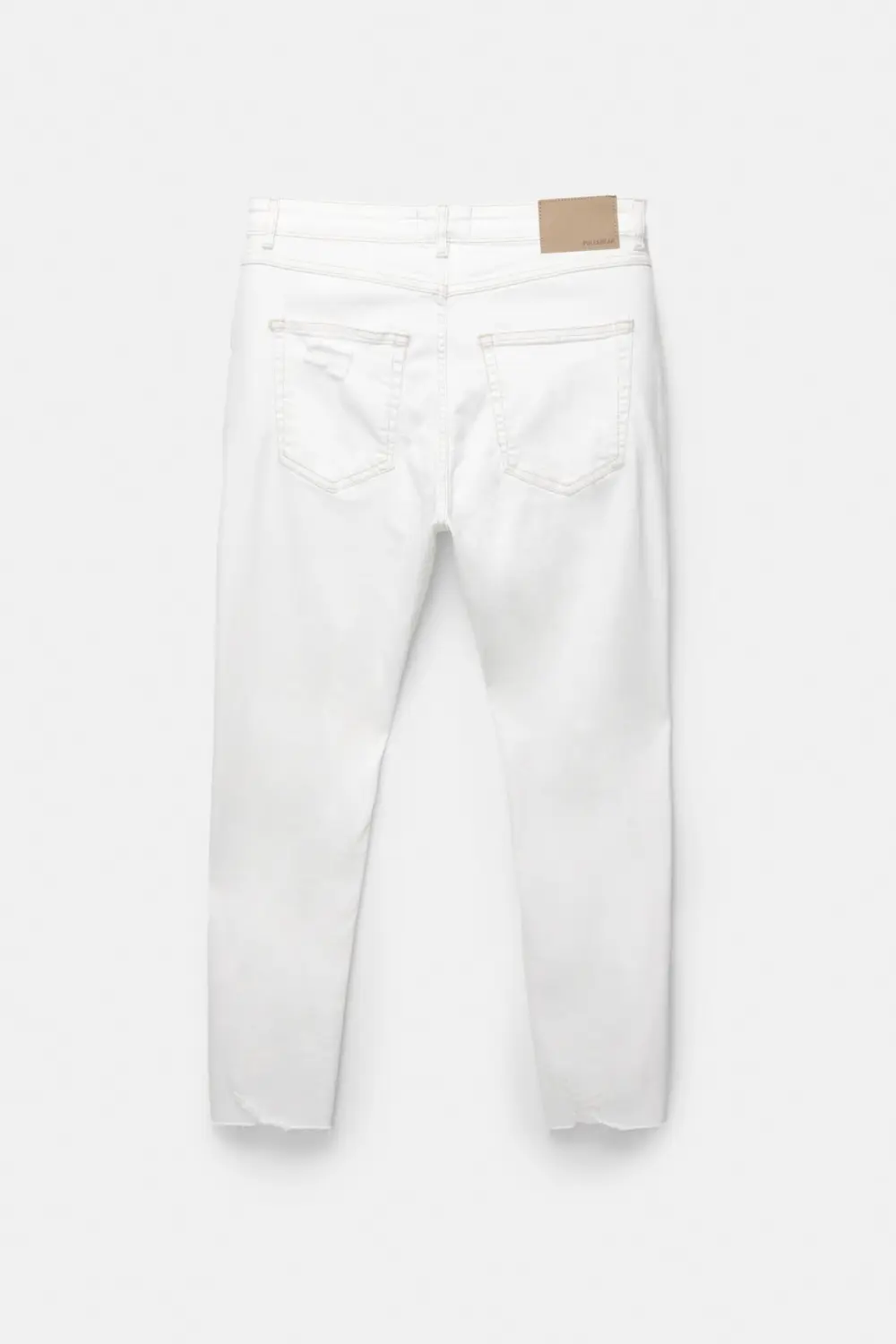 Ripped carrot fit jeans