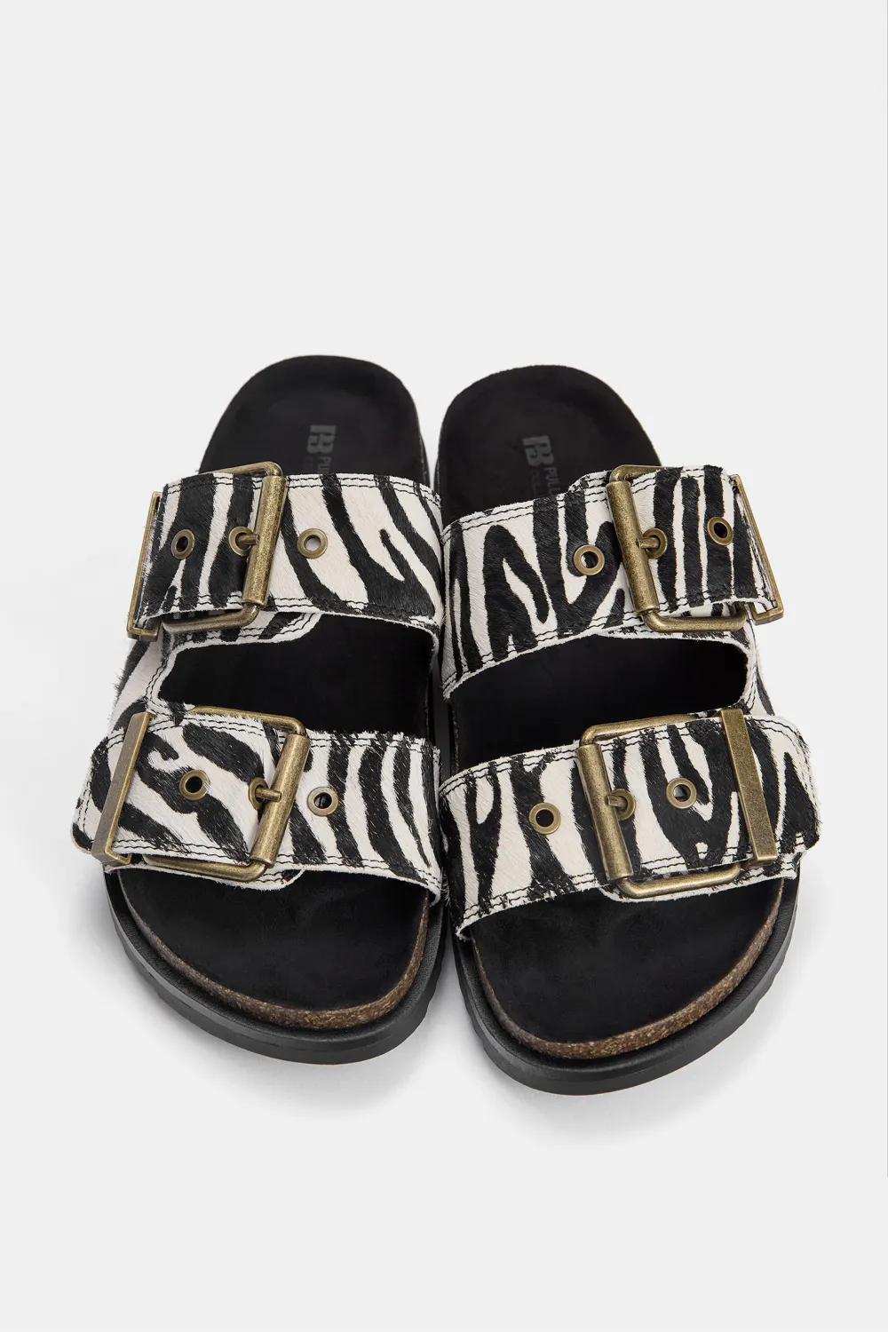 Sandalias planas animal print