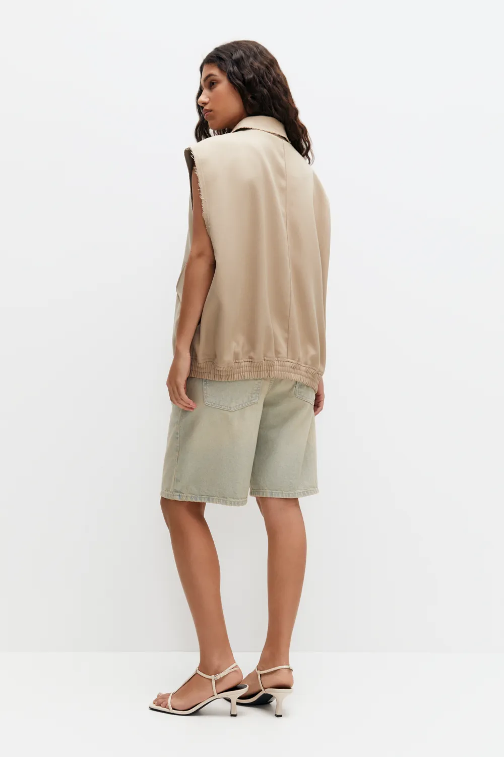 Chaleco oversize mangas desflecadas