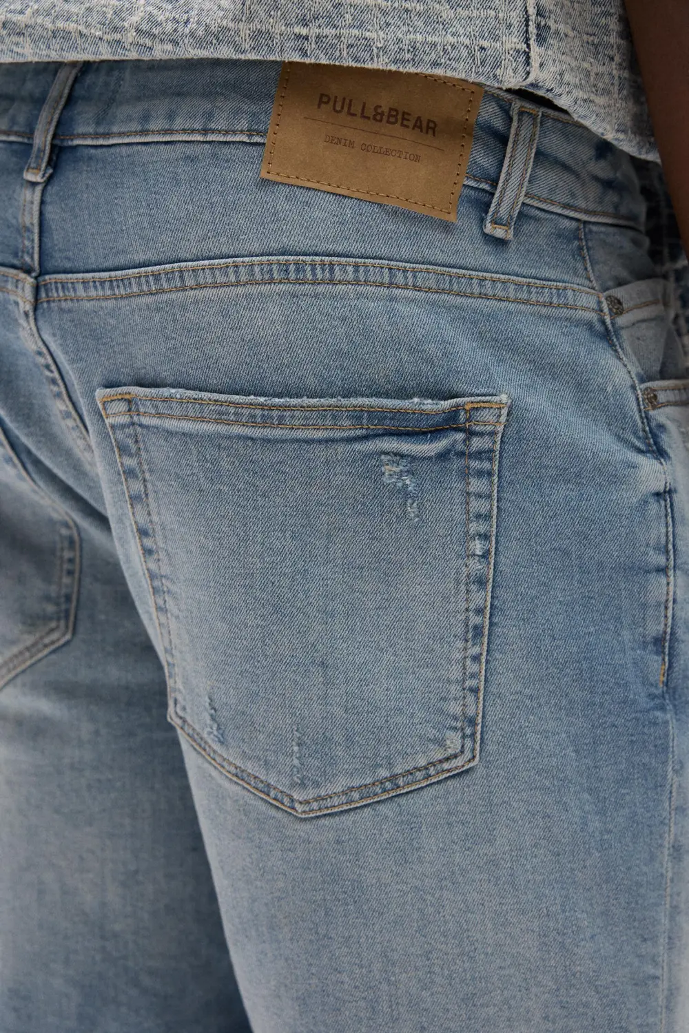 Ripped denim Bermuda shorts