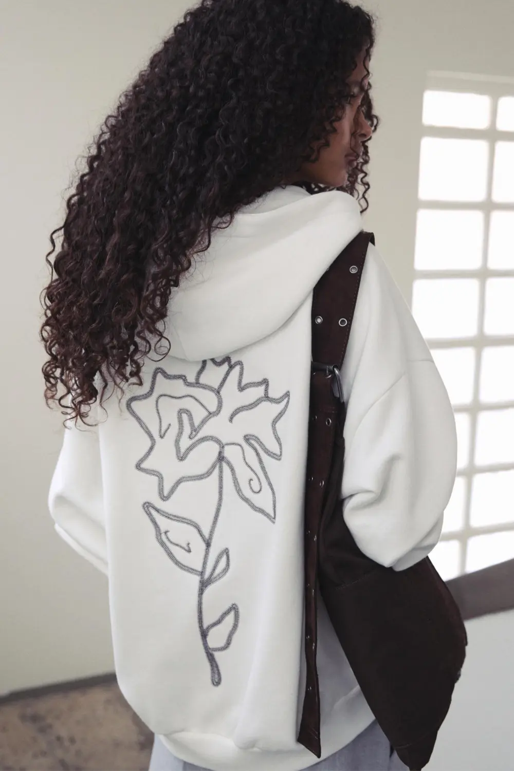 Sudadera capucha cremallera flor