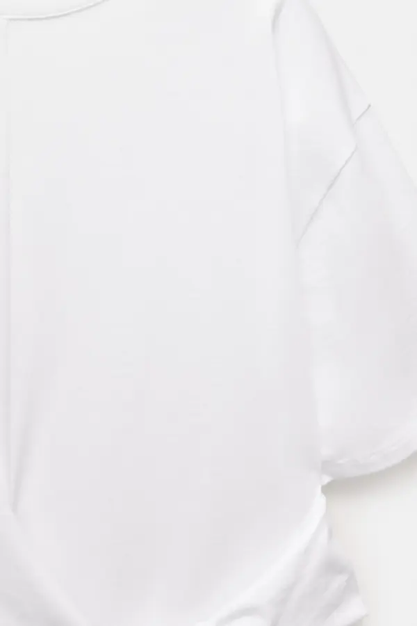 Camiseta manga corta nudo