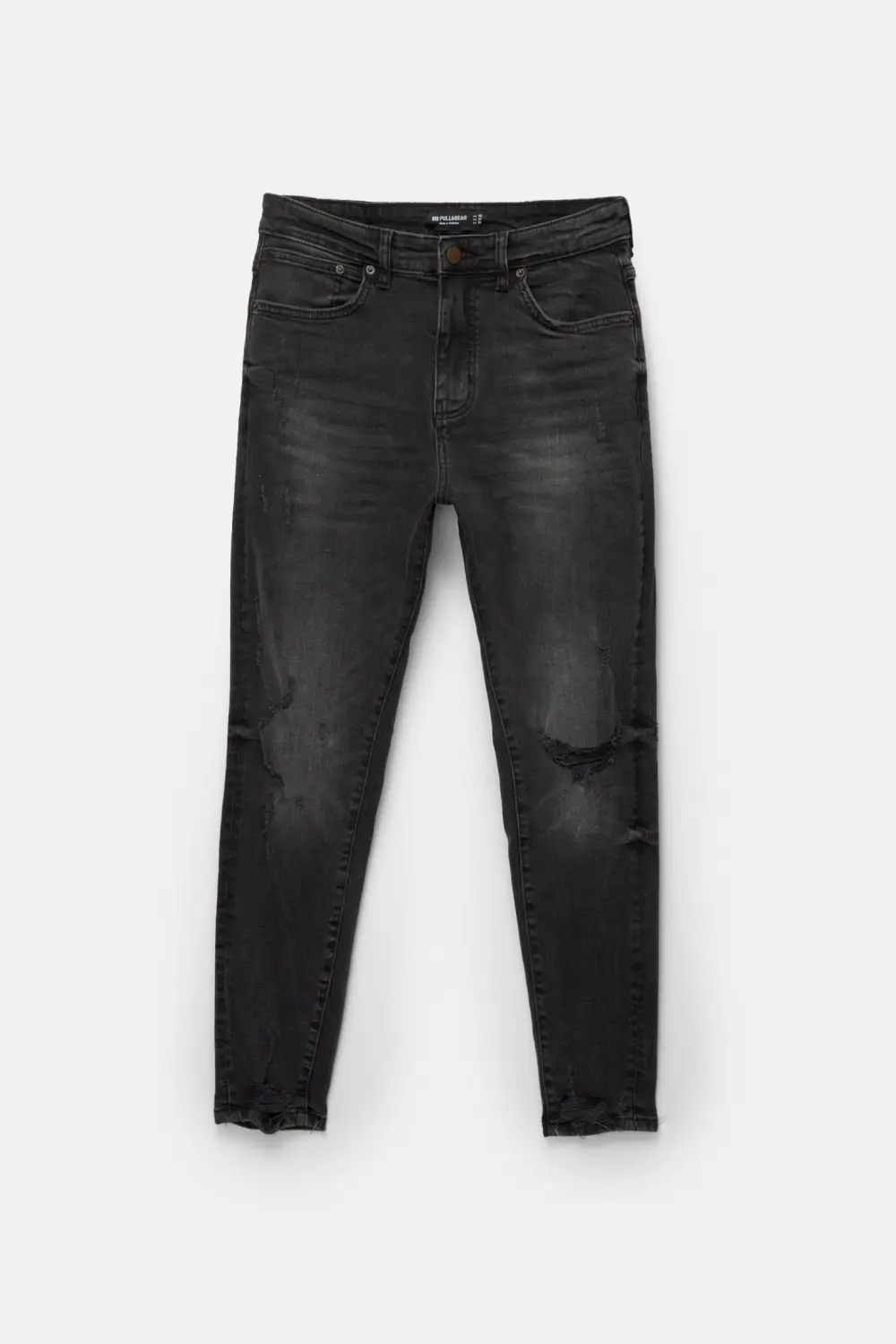 Ripped carrot fit jeans