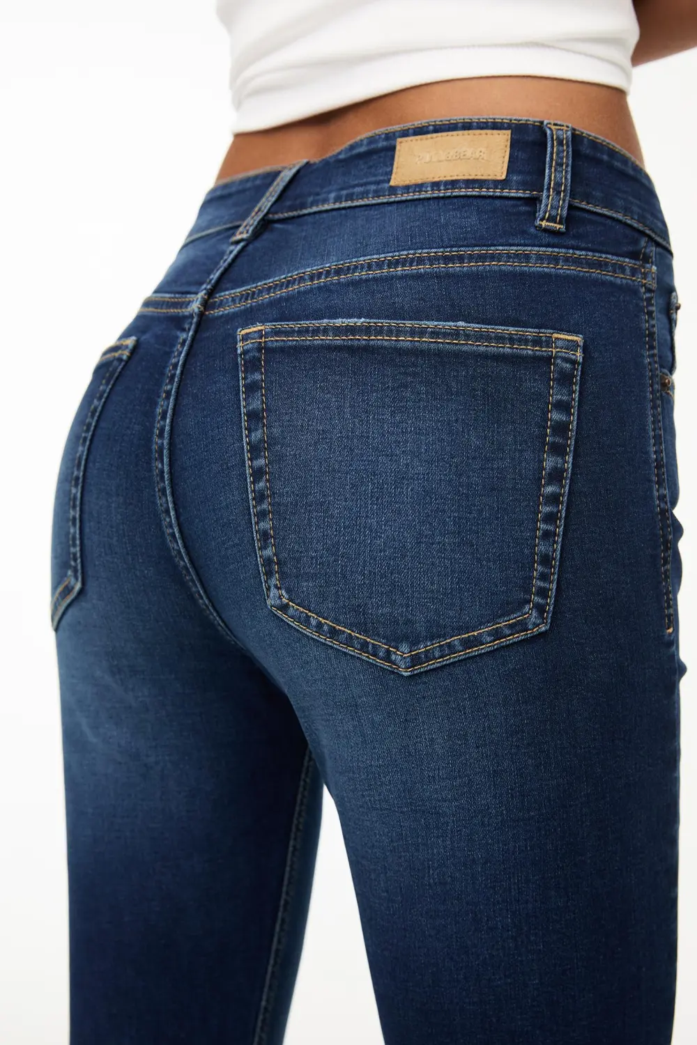 Jeans skinny tiro medio