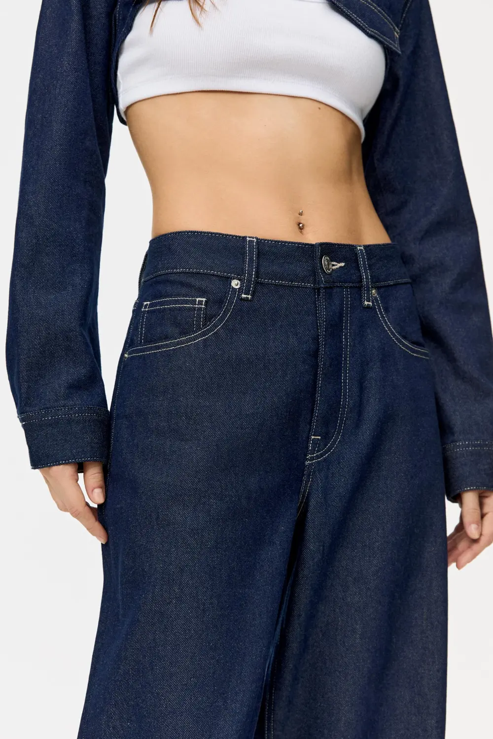 Jeans super wide leg vuelta bajo