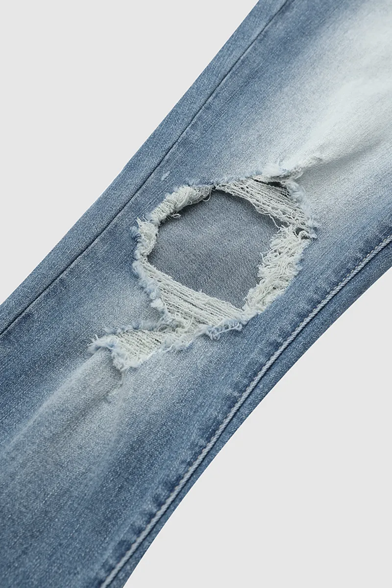 Cut Out Raw Hem Mid Rise Skinny Jeans