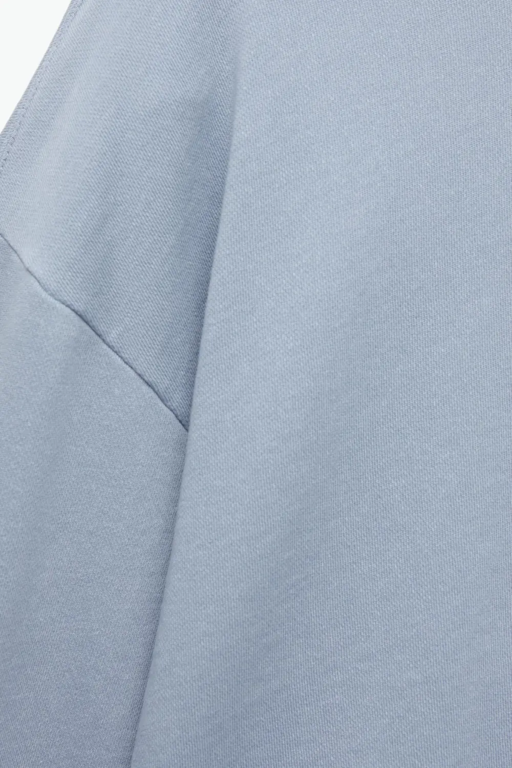 Sudadera boxy bajo desflecado