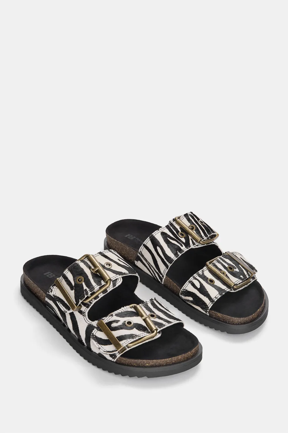 Sandalias planas animal print