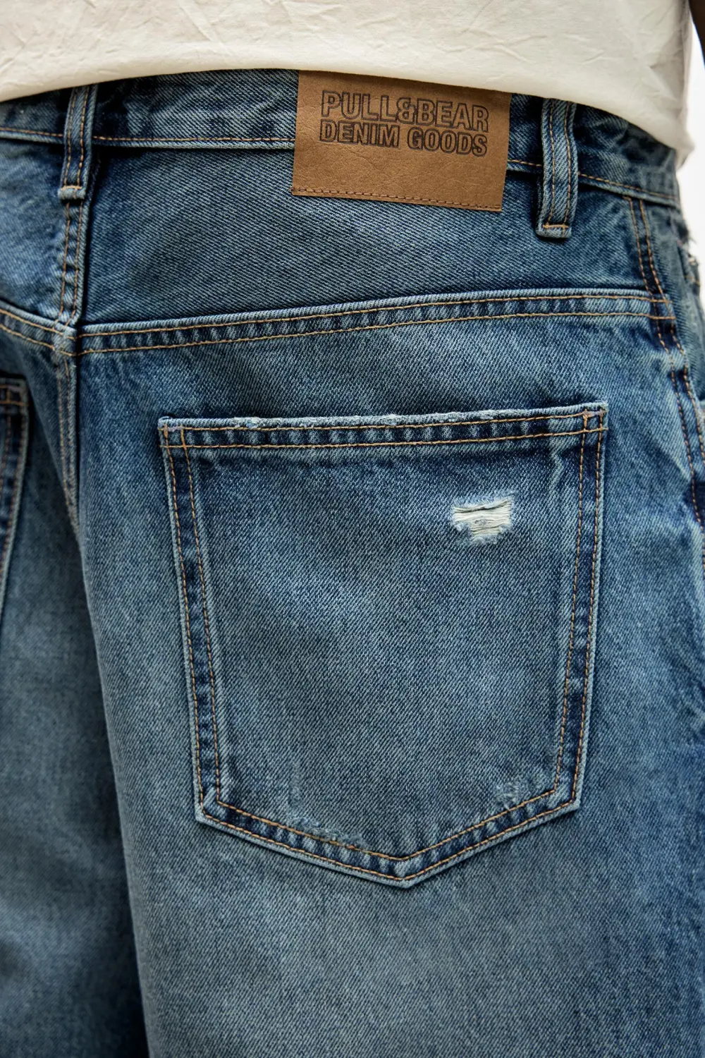 Ripped denim Bermuda shorts