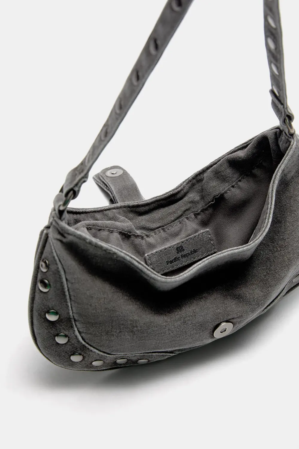 Bolso de hombro canvas tachas