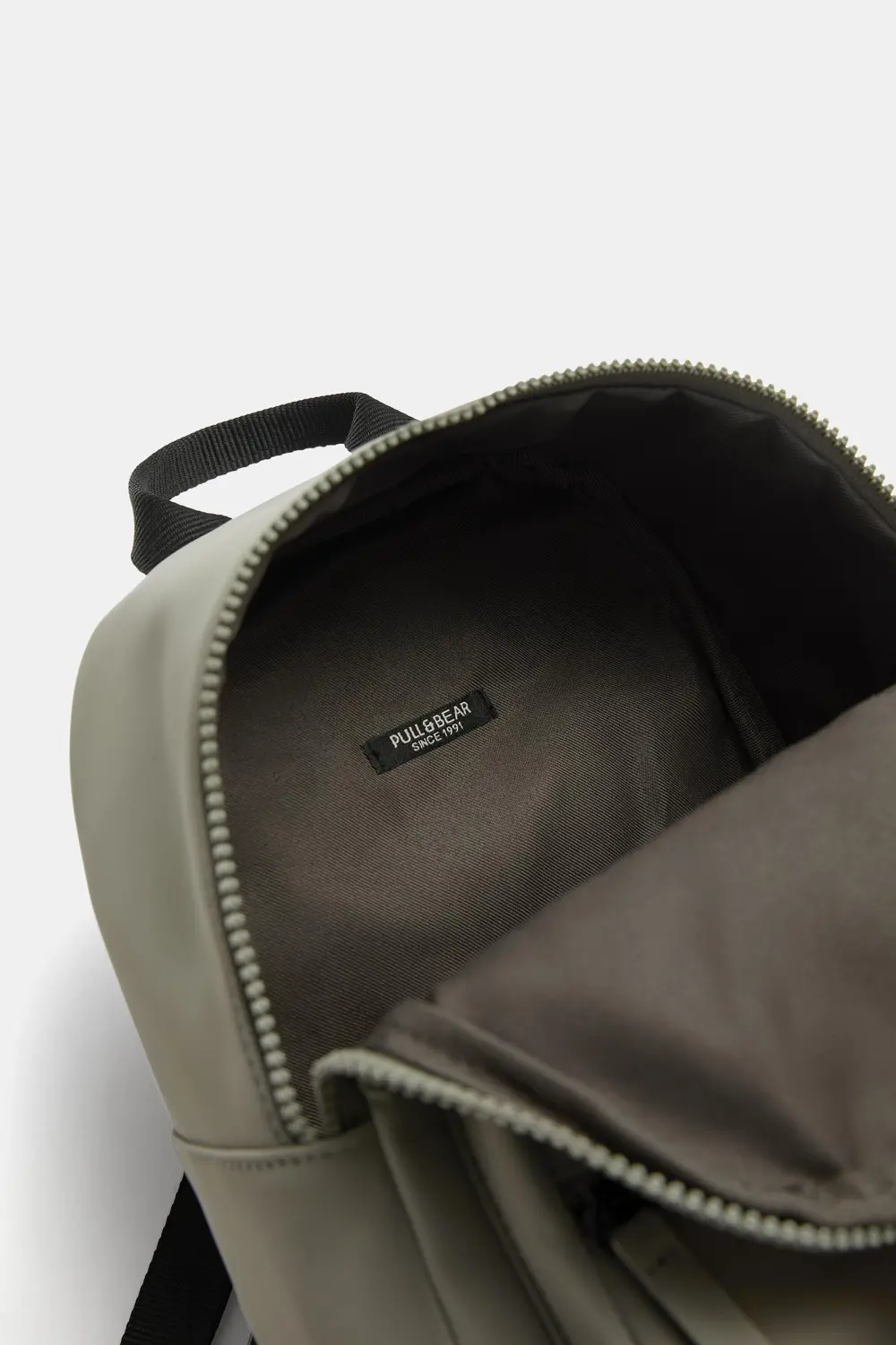 Mini mochila engomada