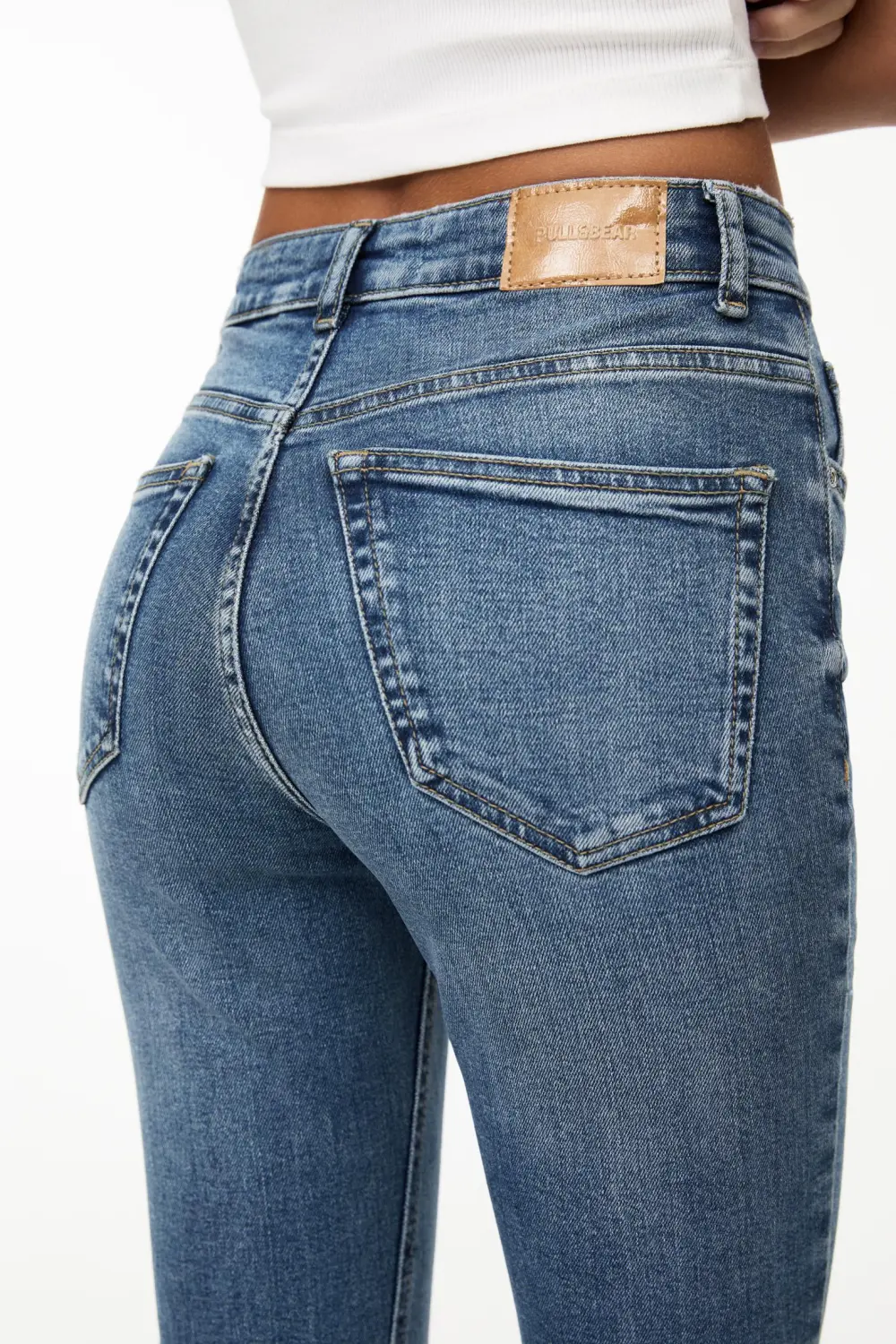 Jeans flare tiro alto