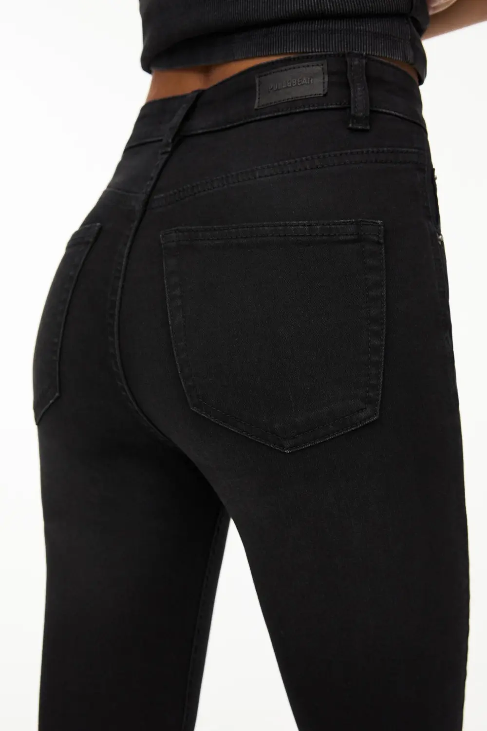 Jeans skinny tiro alto