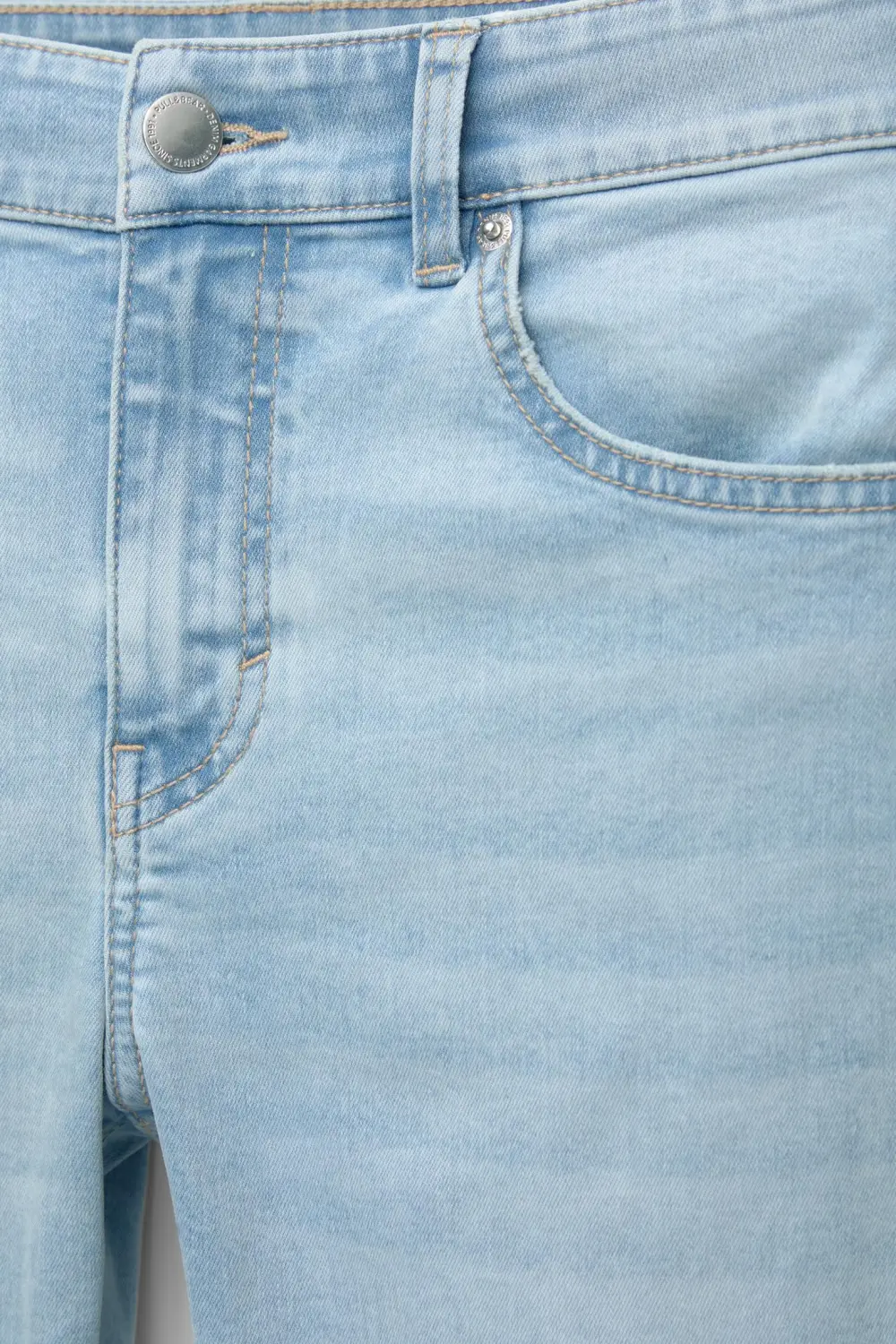 Jeans skinny tiro medio