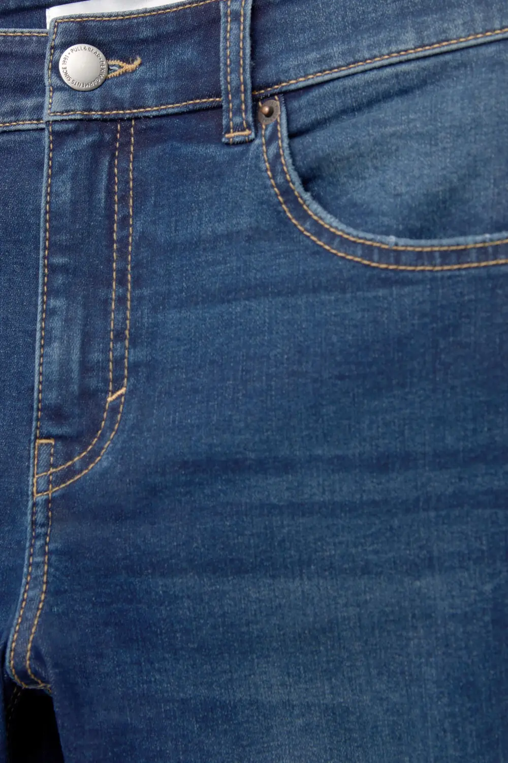 Jeans skinny tiro medio