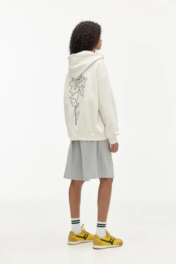 Sudadera capucha cremallera flor