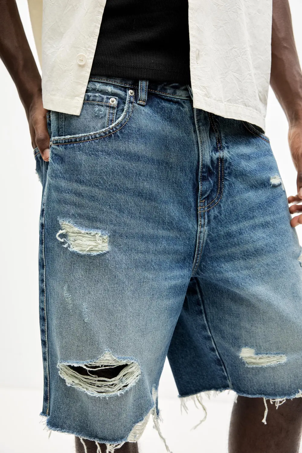 Ripped denim Bermuda shorts