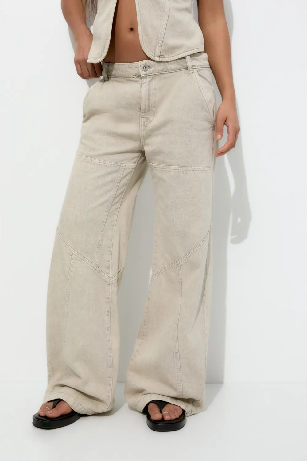 Jeans wide leg costuras marcadas
