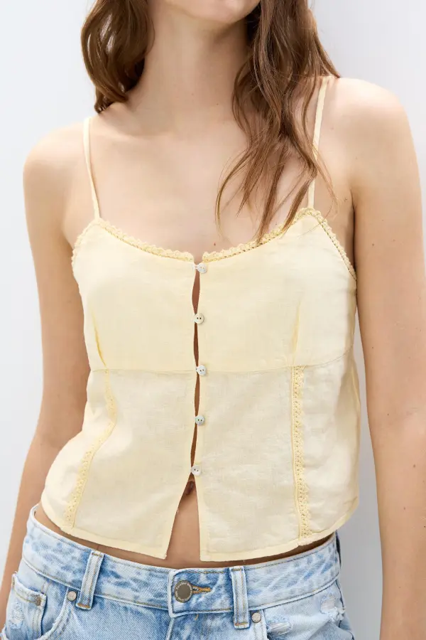 Lace-trimmed top with straps