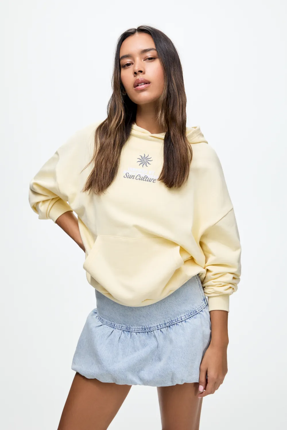 Sudadera capucha bordado sol