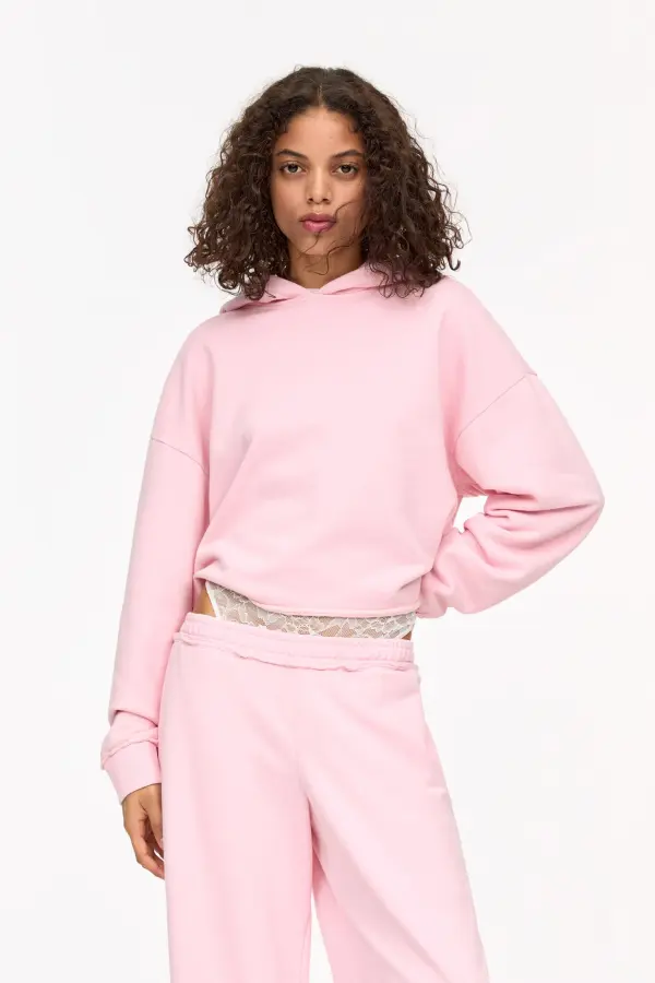 Sudadera boxy bajo desflecado