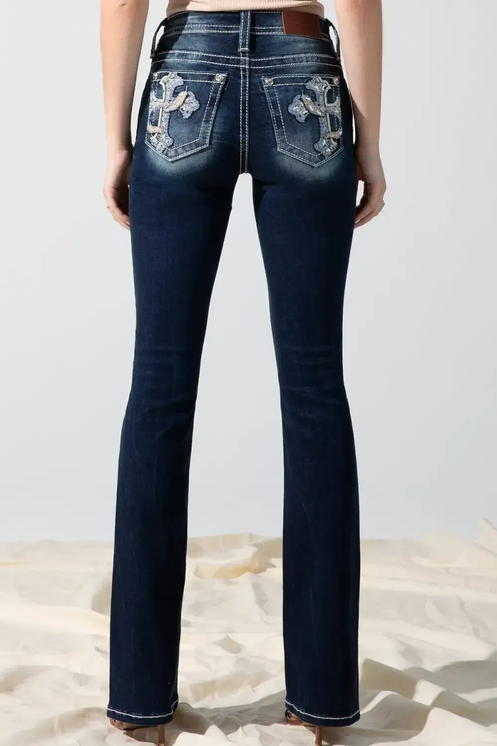 Feathered Cross Bootcut Jeans