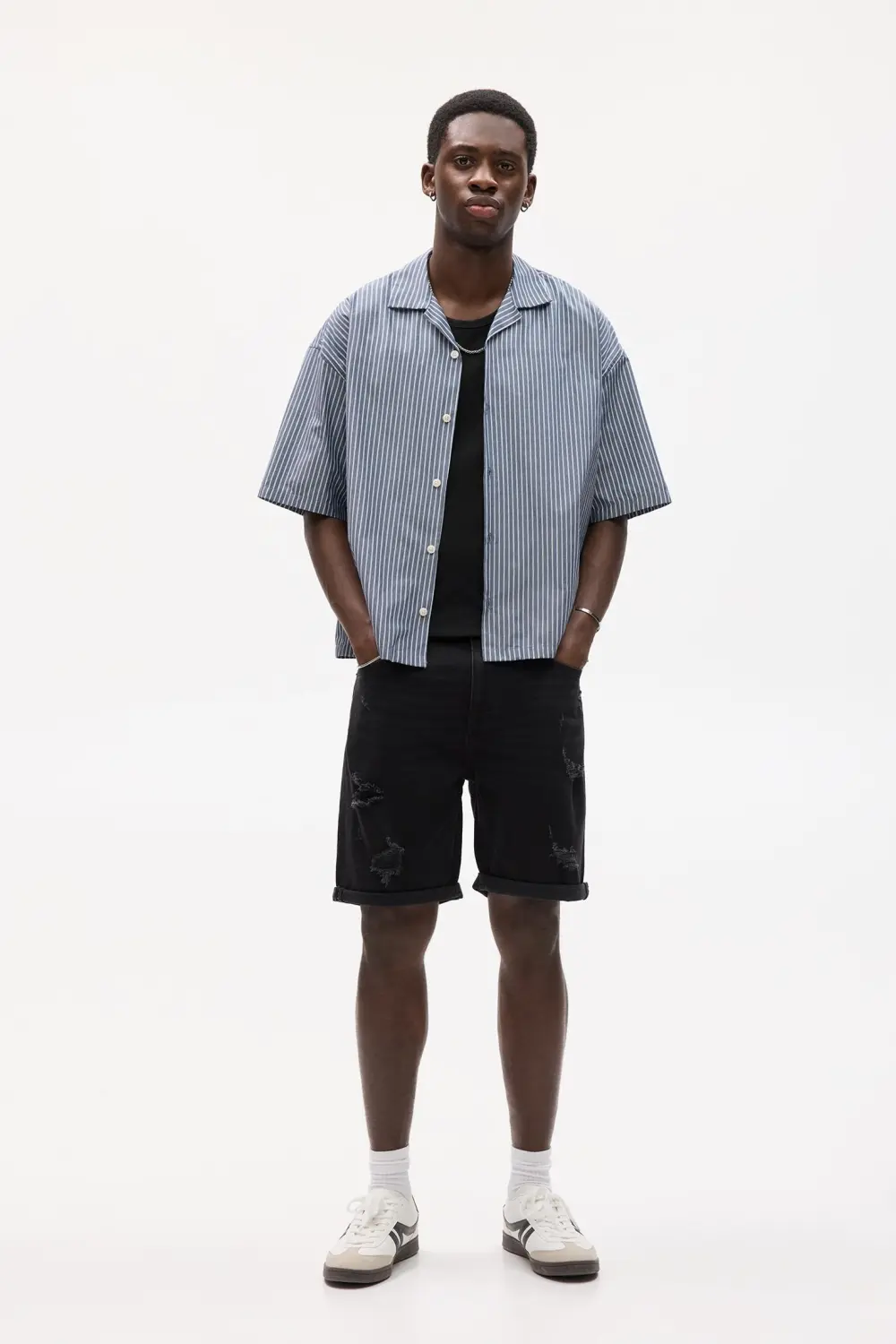 Ripped denim Bermuda shorts