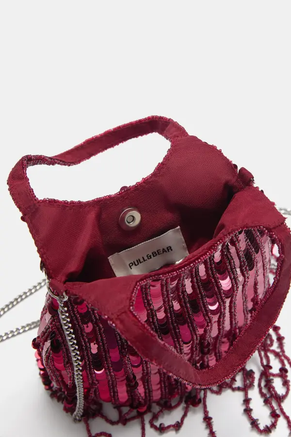 Bolso abalorios flecos