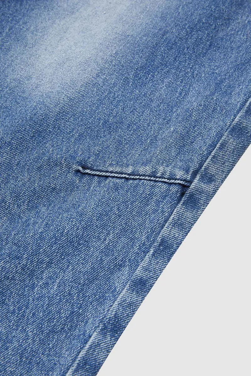 Wash Ripped Mid Rise Barrel Leg Jeans