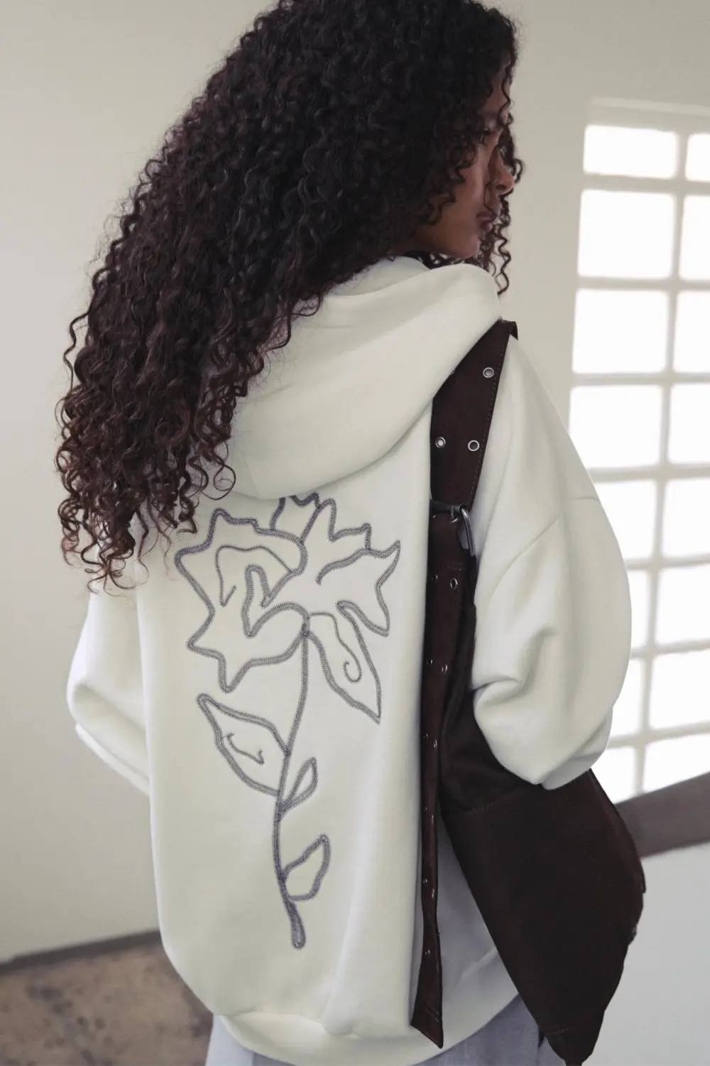 Sudadera capucha cremallera flor