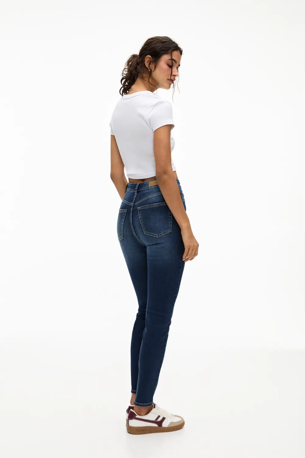 Jeans skinny tiro alto
