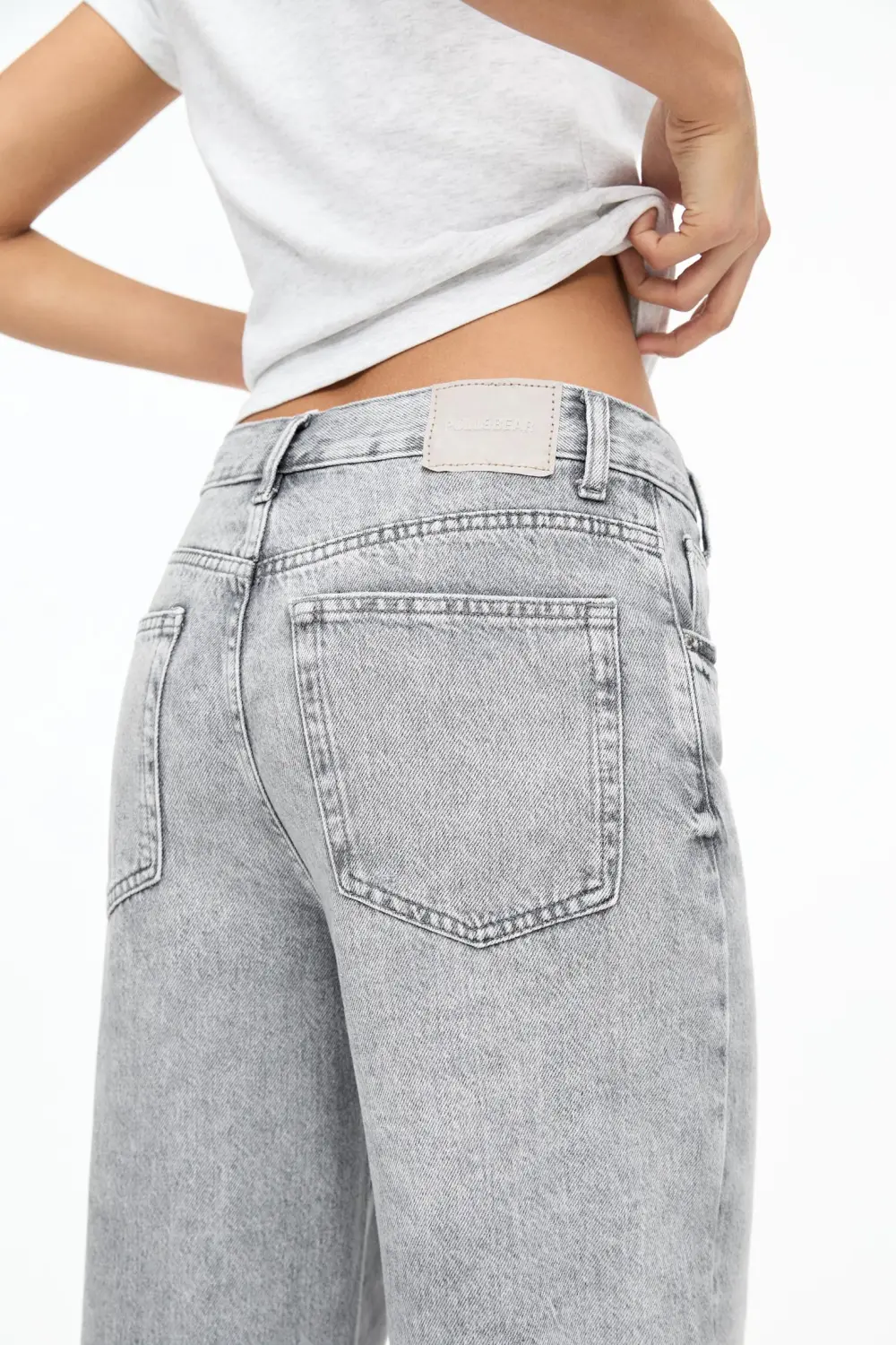 Jeans wide leg cintura cruzada