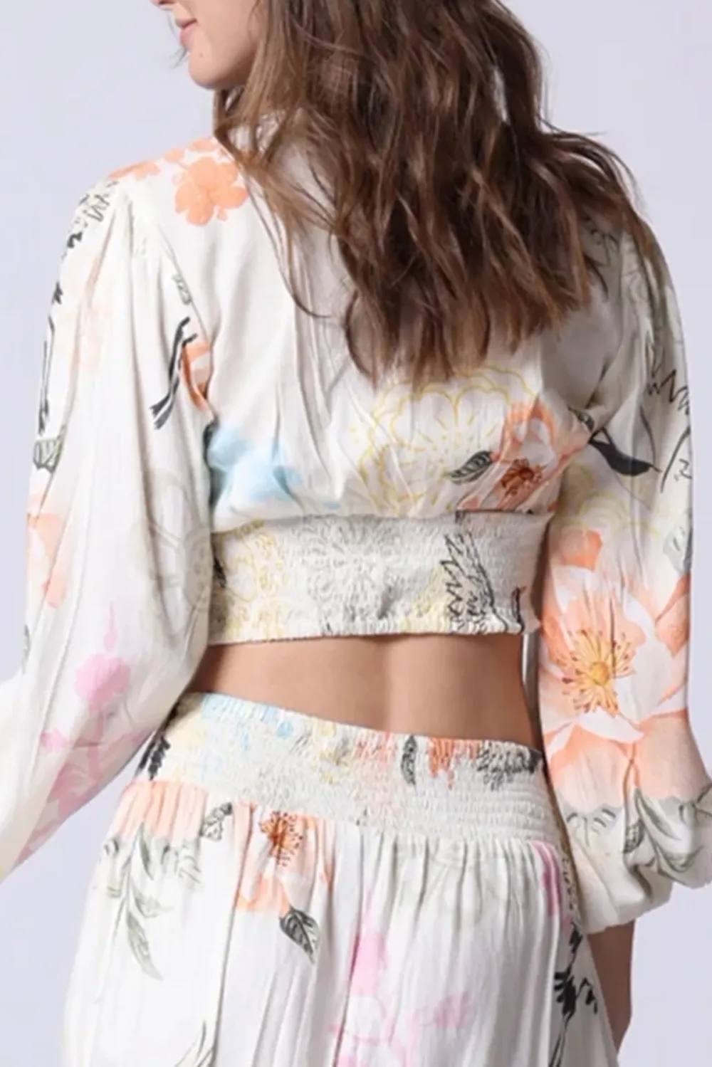 White And Multicolor Floral Print Crop Top And Asymmetrical Skirt Set