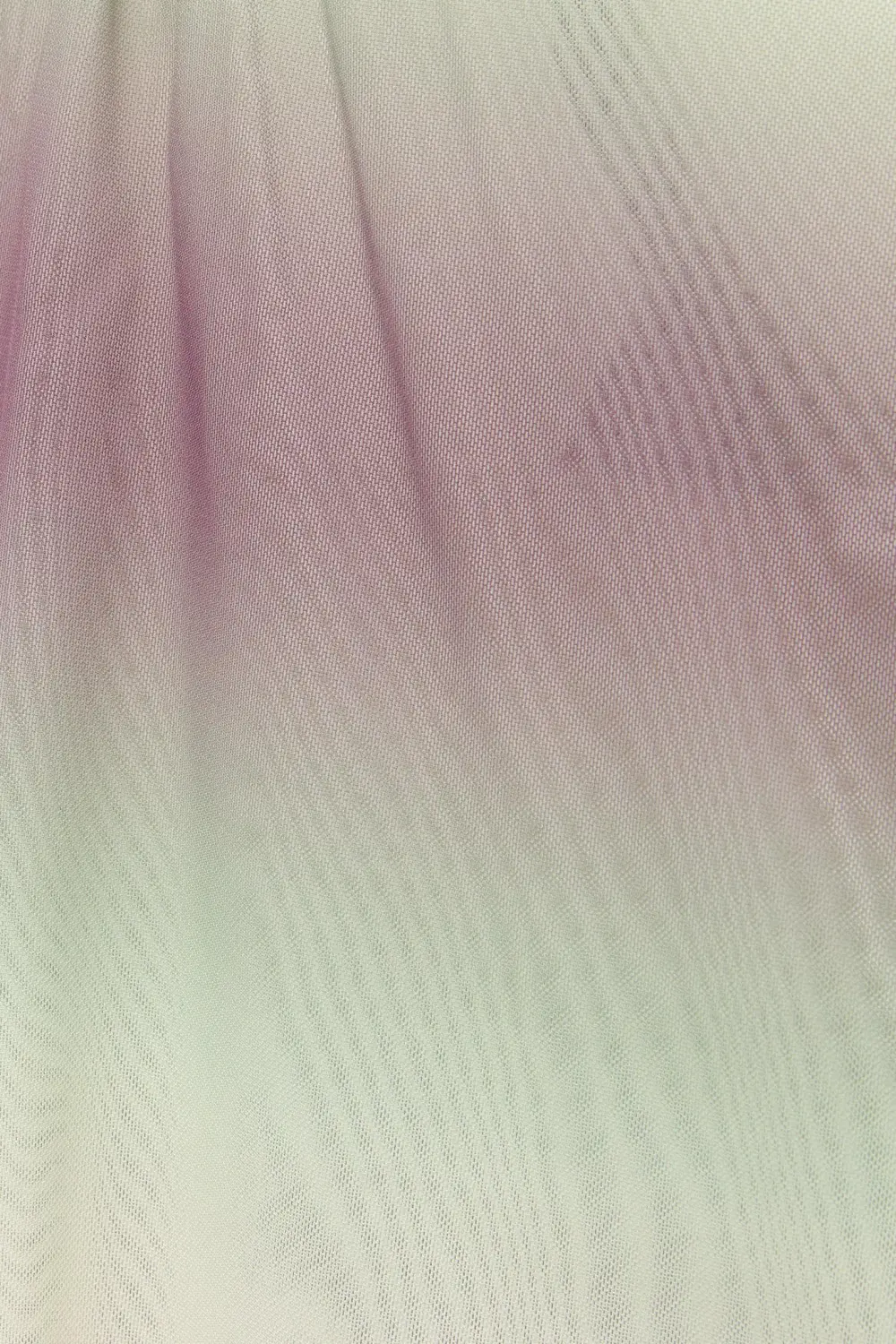 Asymmetric tulle top with a knotted strap