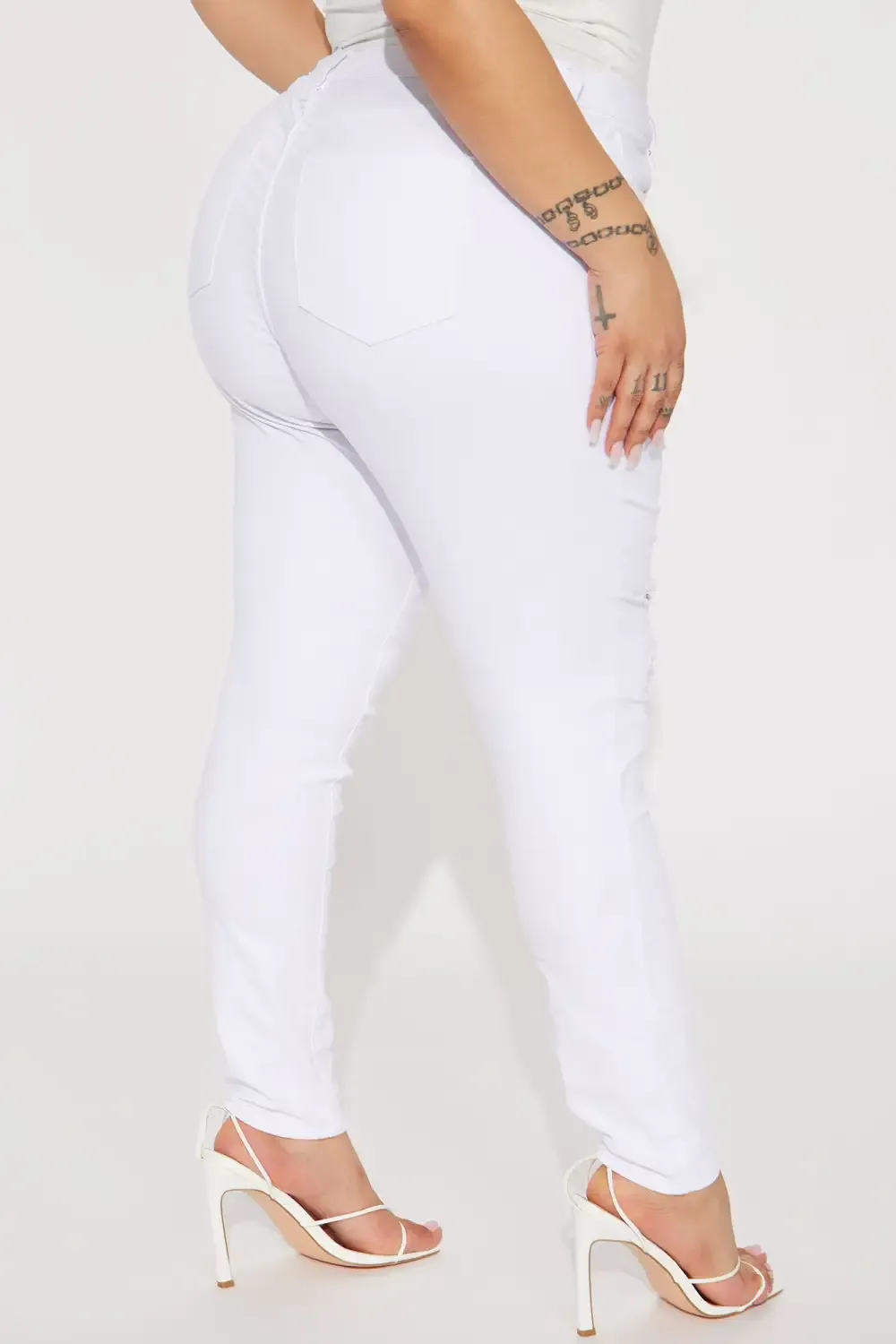 Raven Ripped  Mid Rise Stretch Skinny Jeans - White