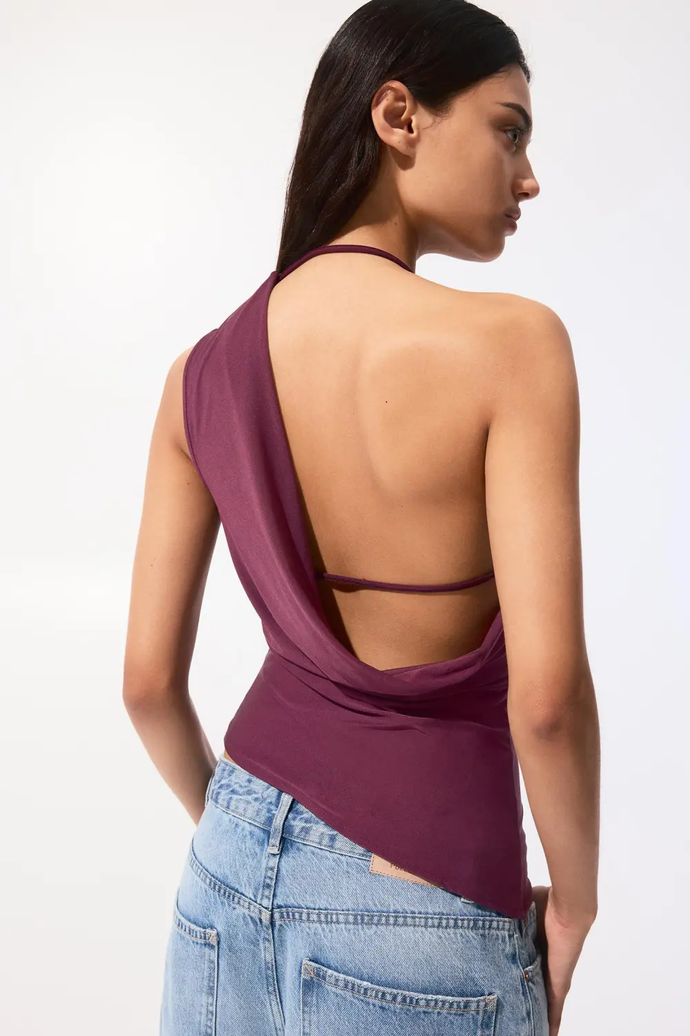 Asymmetric top with strap