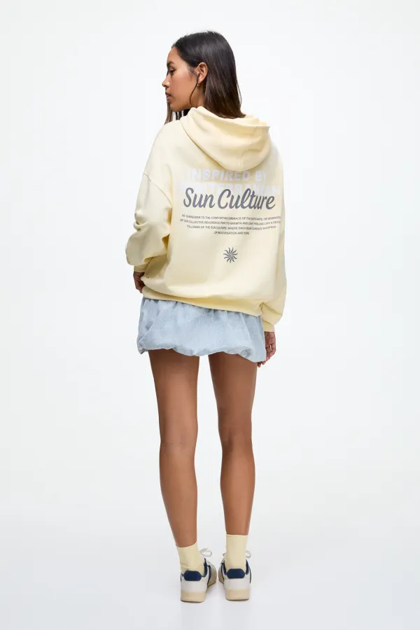 Sudadera capucha bordado sol