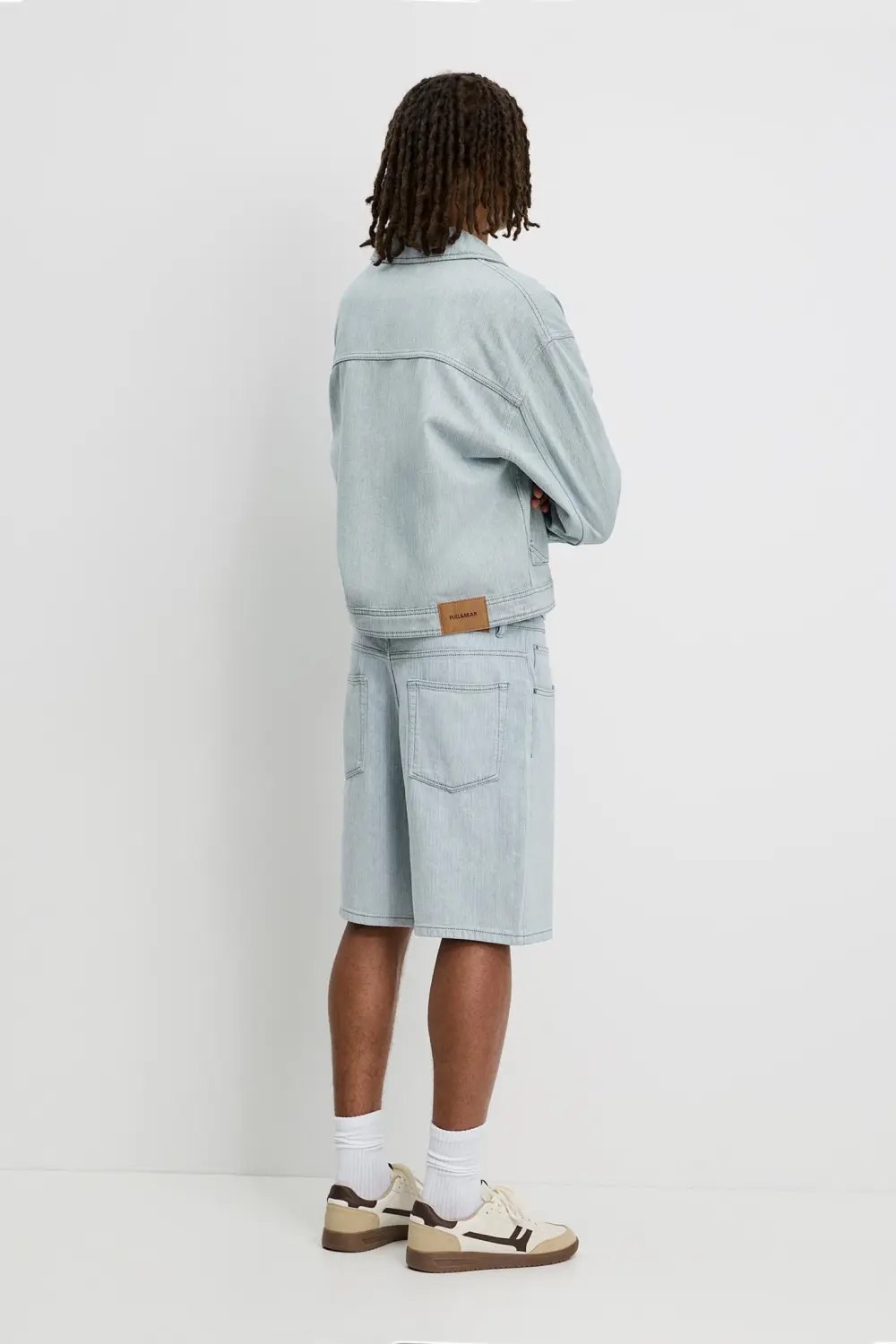 Baggy textured denim Bermuda shorts