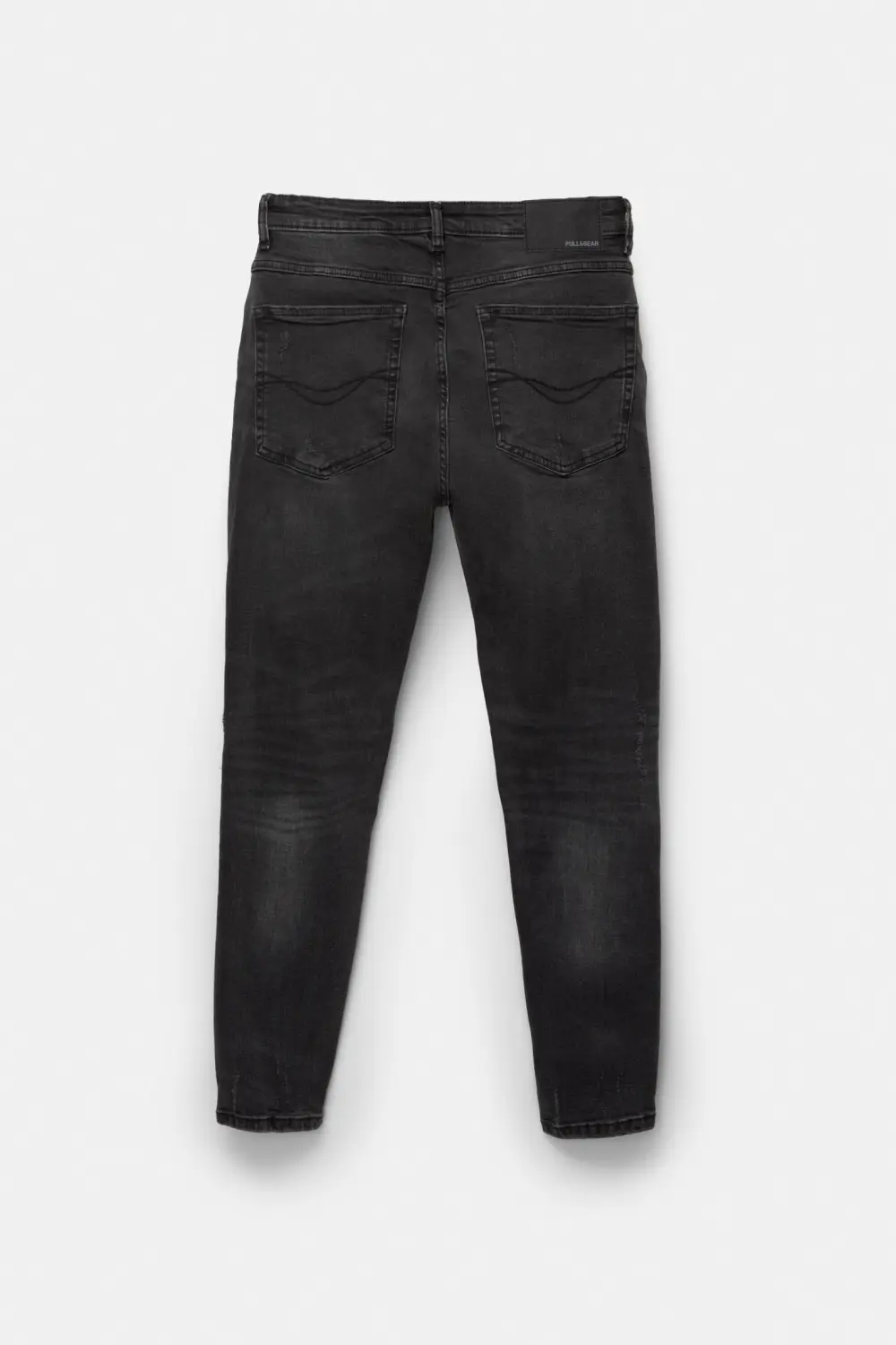 Ripped carrot fit jeans
