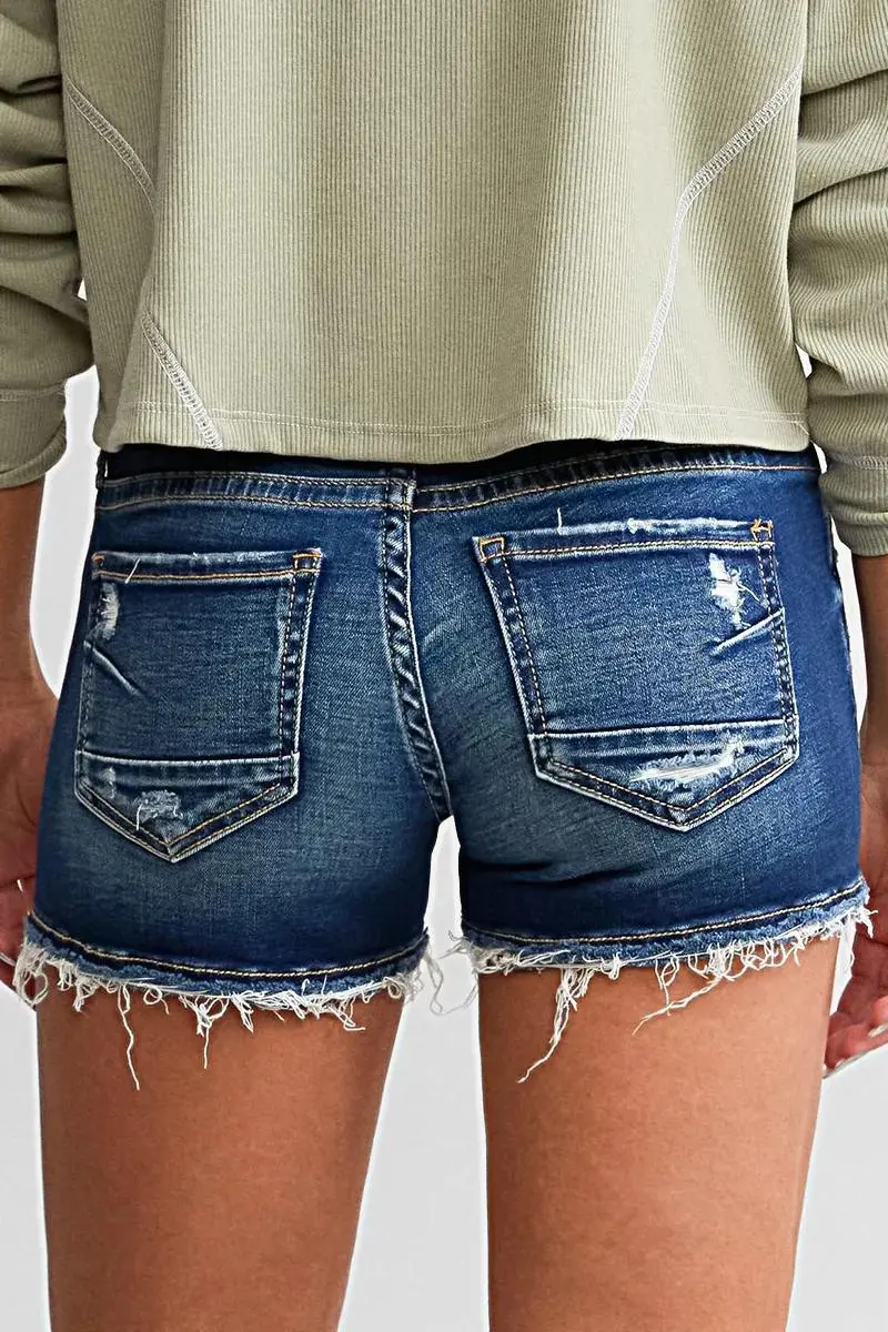 Ripped Raw Hem Button Up Mid Rise Denim Shorts