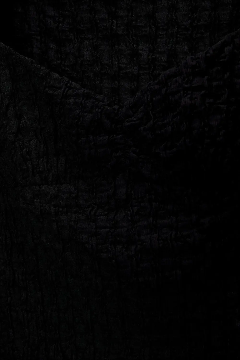 Textured corsetry-inspired top