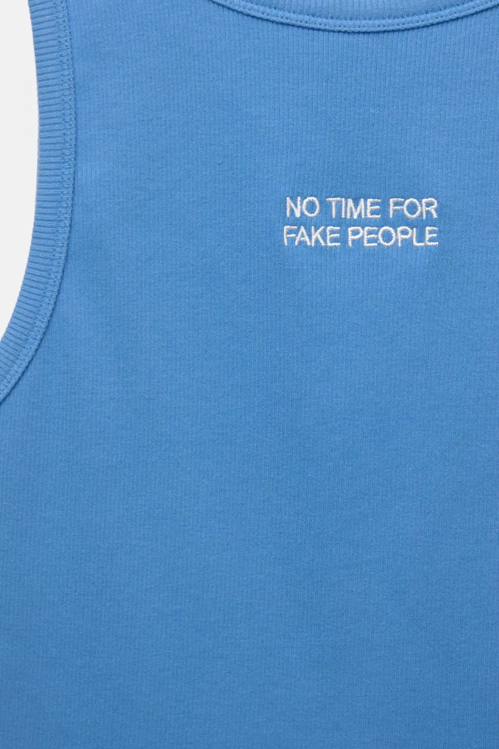 Blue tank top with slogan