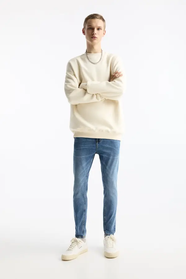 Washed carrot-fit jeans